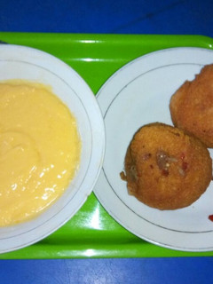 A picture of Akara(bean balls) with custard.