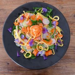 A picture of Salmon oyako chirashi sushi.