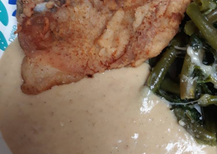 Down to the Bone Porkchop with Flavorful Gravy