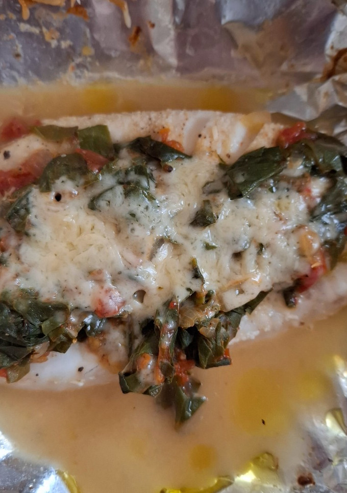 Una foto de Pescado empapelado con acelgas