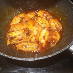 A picture of Honey glazed garlic wings.