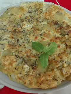 Una foto de Tortilla con hierbabuena y tomillo