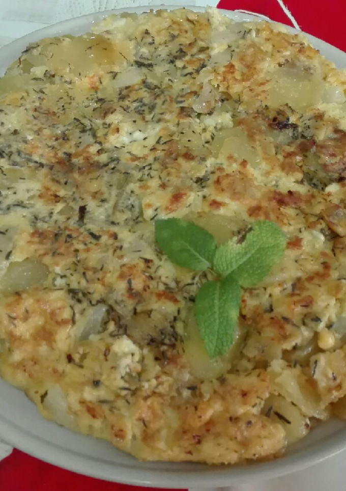 Una foto de Tortilla con hierbabuena y tomillo