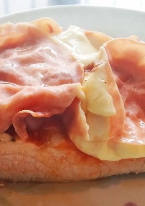 Una foto de Lomo a la pizza