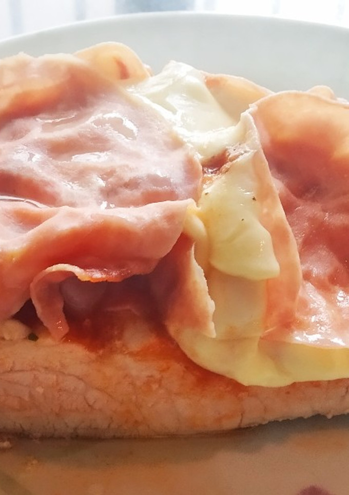 Una foto de Lomo a la pizza