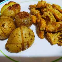 Una foto de Pollo al ajillo con patatas babys al horno