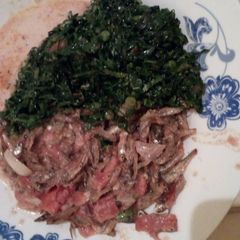 A picture of Stewed omena with greens.