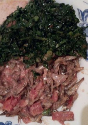 A picture of Stewed omena with greens.
