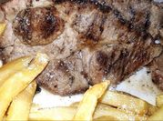 Una foto de bifes de bondiola