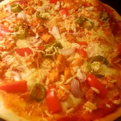 A picture of Homemade Chicken Tikka Pizza 😀.