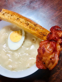 A picture of Cream of Mushroom Macaroni Soup with Herbed Dipping Bread and Bacon.