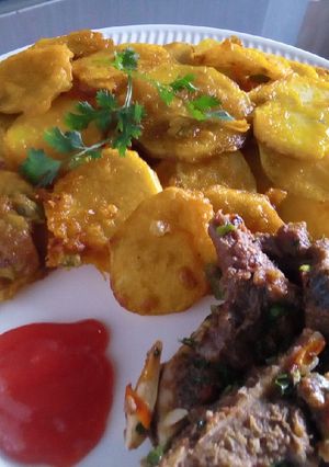 A picture of Viazi karai and wetfry beef.