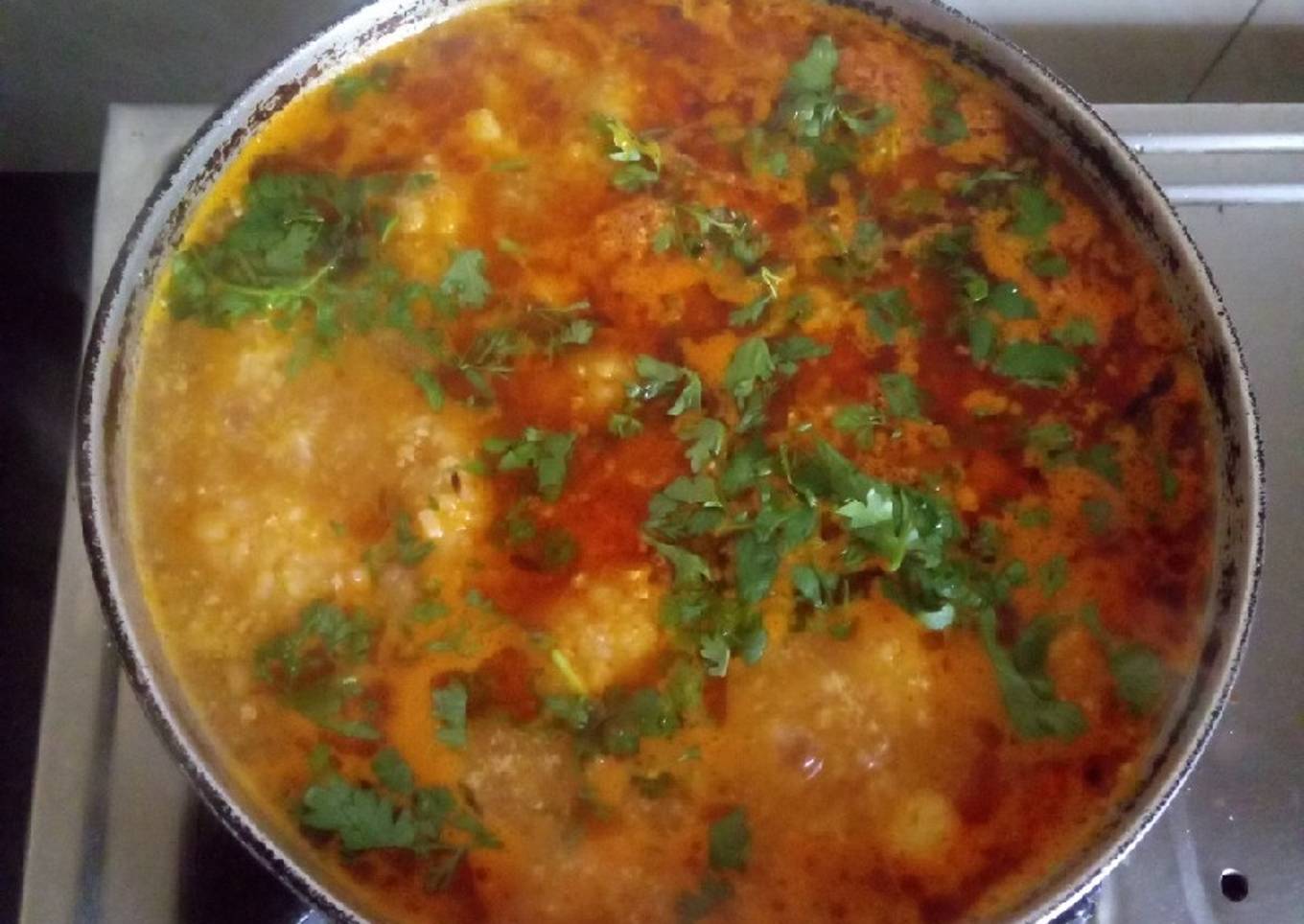 Rasiya Muthiya (Rice dumplings in curry)
