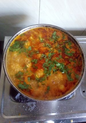 A picture of Rasiya Muthiya (Rice dumplings in curry).