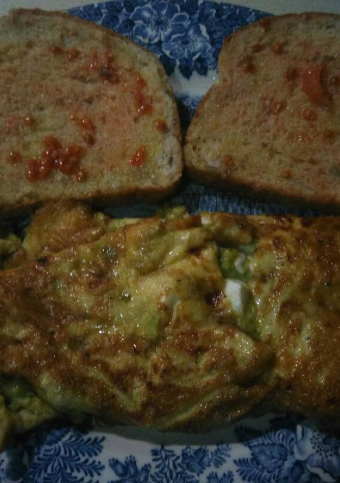 Una foto de Tortilla sabores con pan tomate