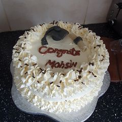 A picture of Graduation cake.