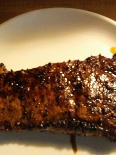 A picture of Steak on the Grill.