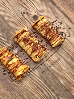 A picture of French toast roll up.