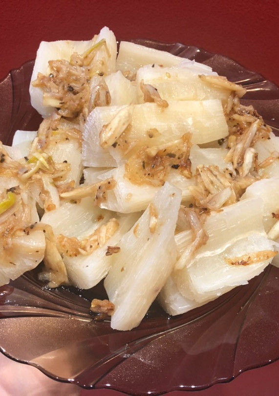 Una foto de Yuca con mojo