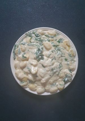 A picture of Gnocchi in rustic Parsley Sauce.