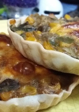 Una foto de Tarteletas de choclo, cebolla y berenjena