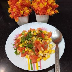 A picture of Corn & Fresh Tomato Salad.