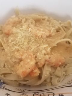 Una foto de Camarones con crema