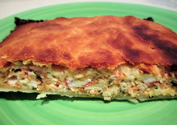 Empanada de pescado y palitos de cangrejo de océano