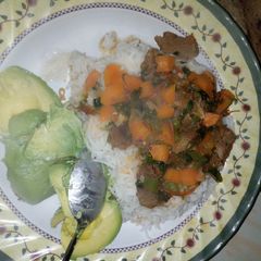 Beef stew and rice A picture of Beef stew and rice.