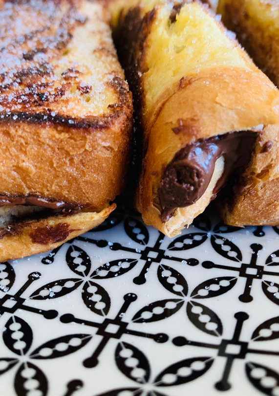 Una foto de Toast rolls de nutella
