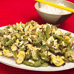 A picture of Sautéed Bitter Melon with Salty Eggs (Tumis Pare Telur Asin).