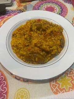 Una foto de Arroz meloso con costillas y secreto