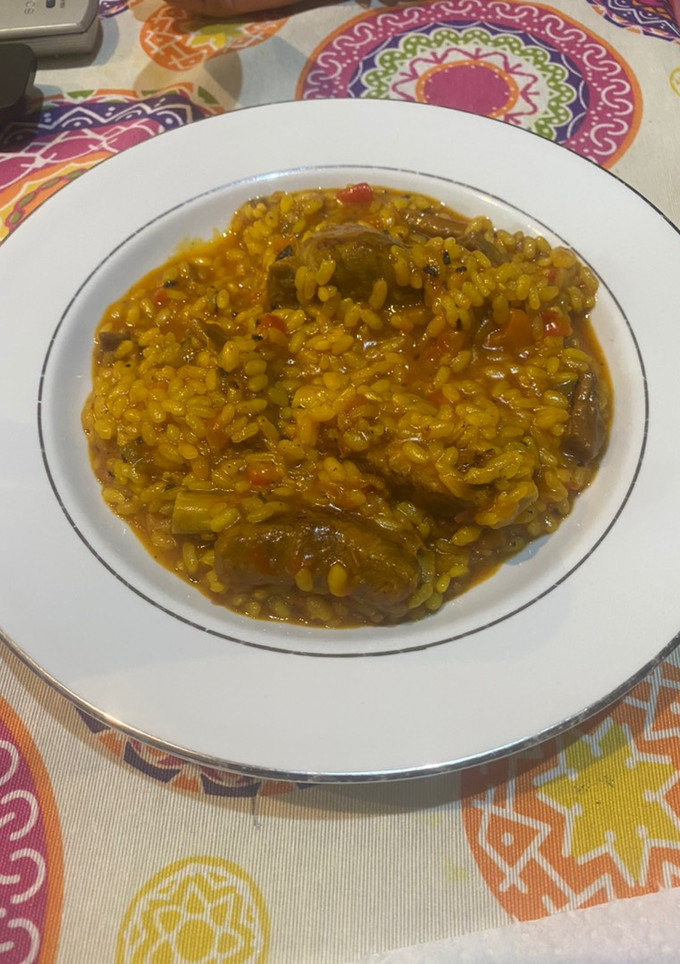 Una foto de Arroz meloso con costillas y secreto