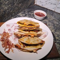 A picture of Rajma masala paneer tortilla wrap.