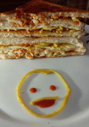 A picture of Noodles cheese sandwich.