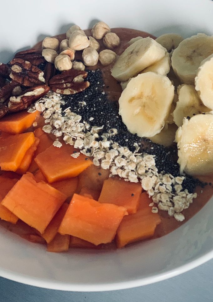 Una foto de Bowl papaya desayuno