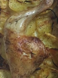 Una foto de Muslo asado al vino blanco