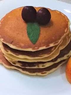 Una foto de Tortitas americanas con miel