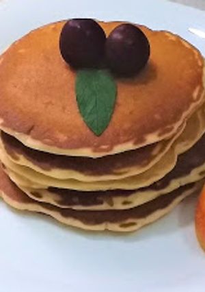 Una foto de Tortitas americanas con miel