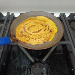 A picture of Tawa punch male dal Rotti golden dossa.