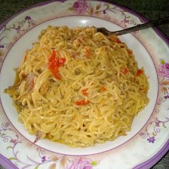 A picture of Indomie with dry fish.