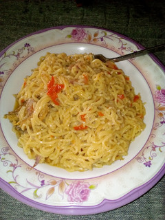 A picture of Indomie with dry fish.