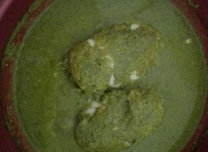 Una foto de Pollo en mole verde