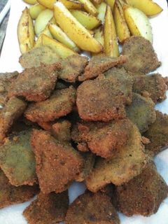 Una foto de Lengua de cerdo empanada