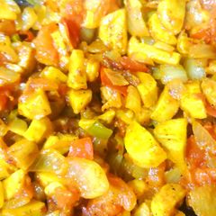A picture of Arbi with onion and tomato.