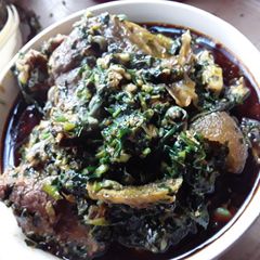 A picture of Spicy GOAT MEAT IN Vegetable Soup.