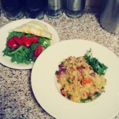 A picture of Stir fry couscous and Kale-fried egg salad.