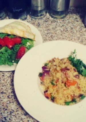 A picture of Stir fry couscous and Kale-fried egg salad.