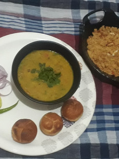 A picture of Dal bati churma.