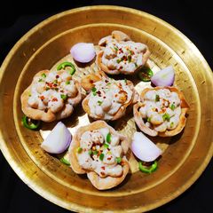 A picture of Chole bhature cheese cups.